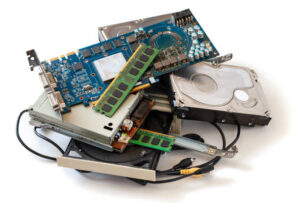 Pile of old computer devices. Isolated on white.