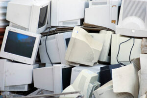 Electronic waste, a large pile of unwanted computer monitors